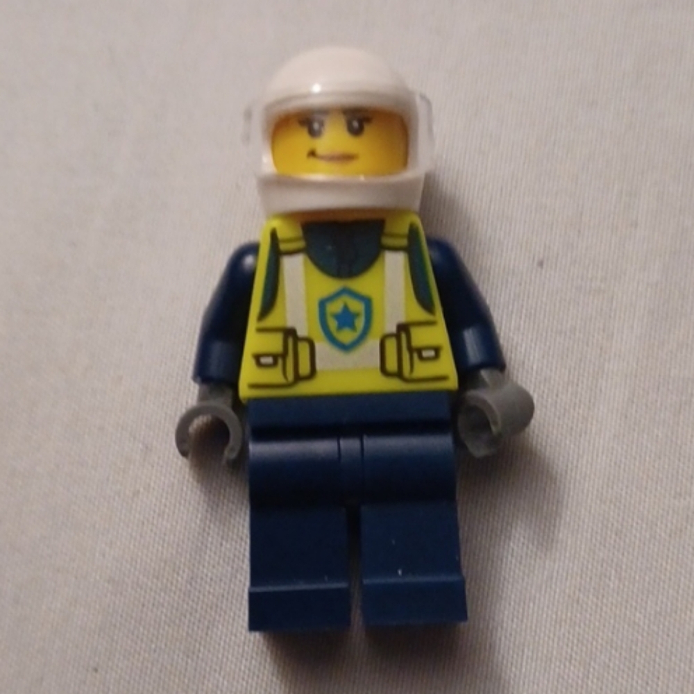 4/$80 LEGO City Female Police Officer Minifigure in Dark Blue & Yellow Vest